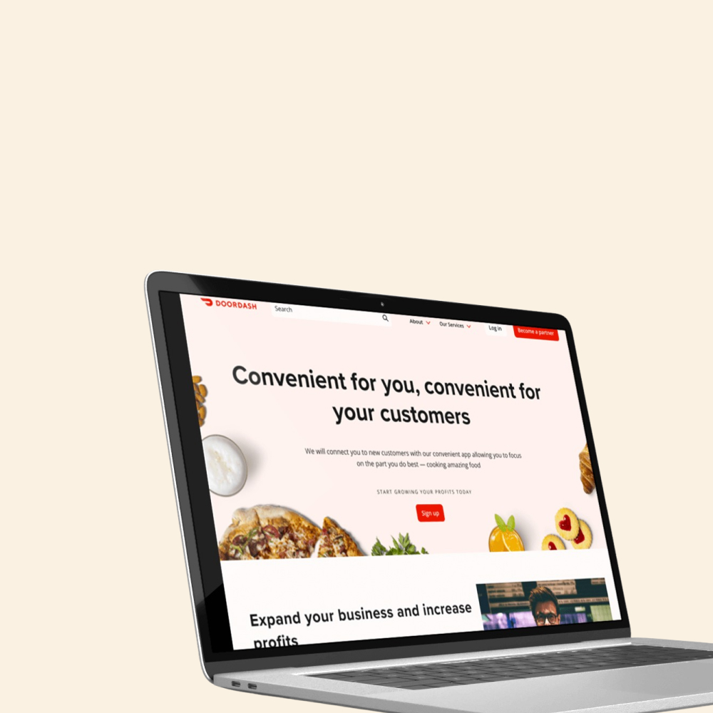 A notebook with a website displayed on its screen."